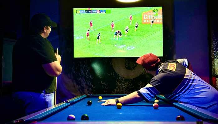 Pool table with live rugby on TV at Spinners Bar & Bowl Maroochydore